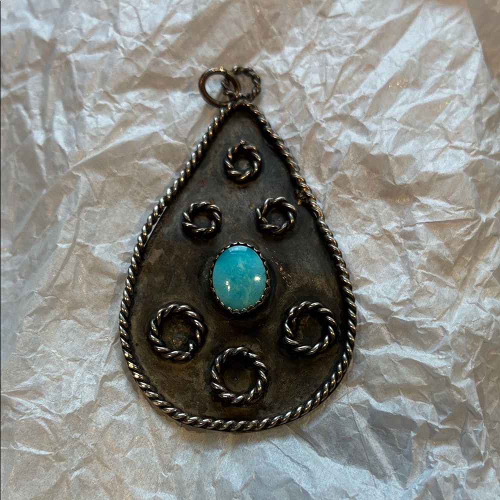 Vintage Navajo sterling silver pendant with turquoise